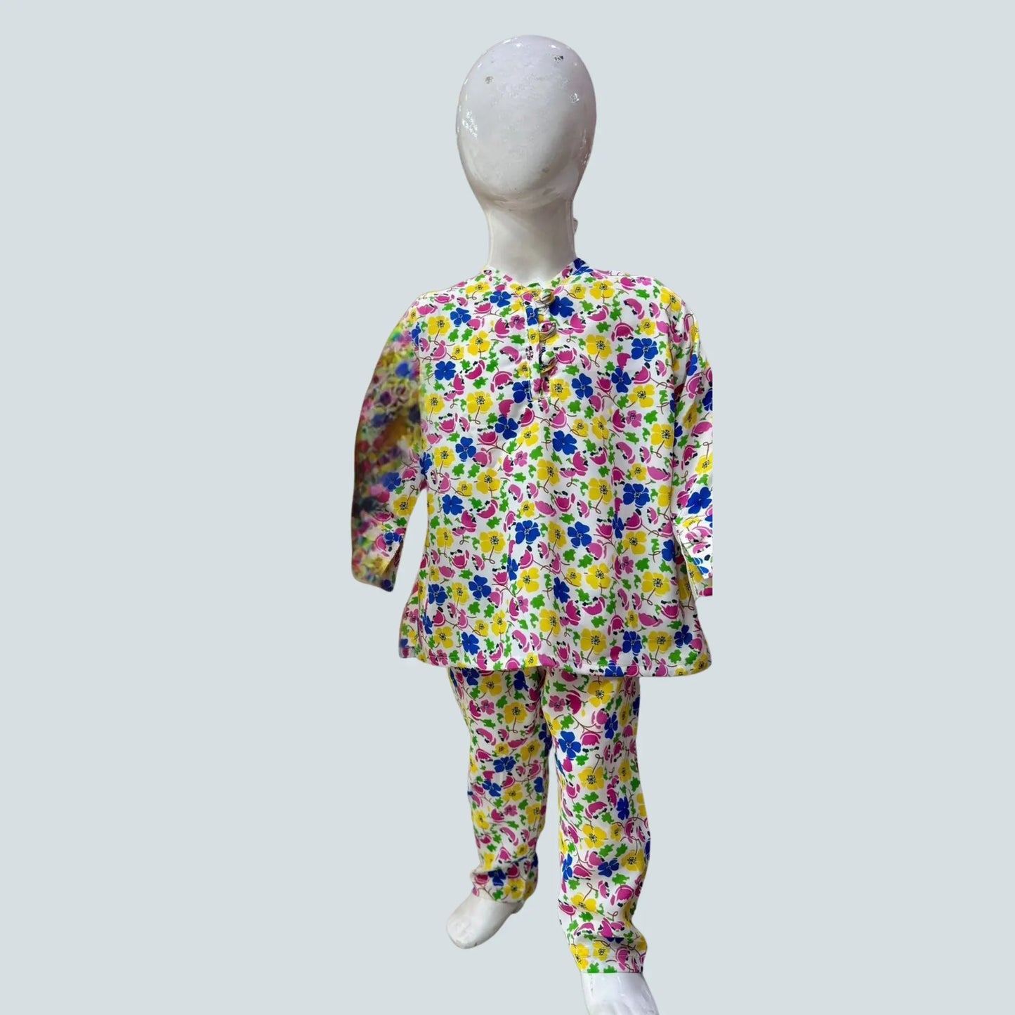 Colorful floral outfit on a mannequin against a light gray background