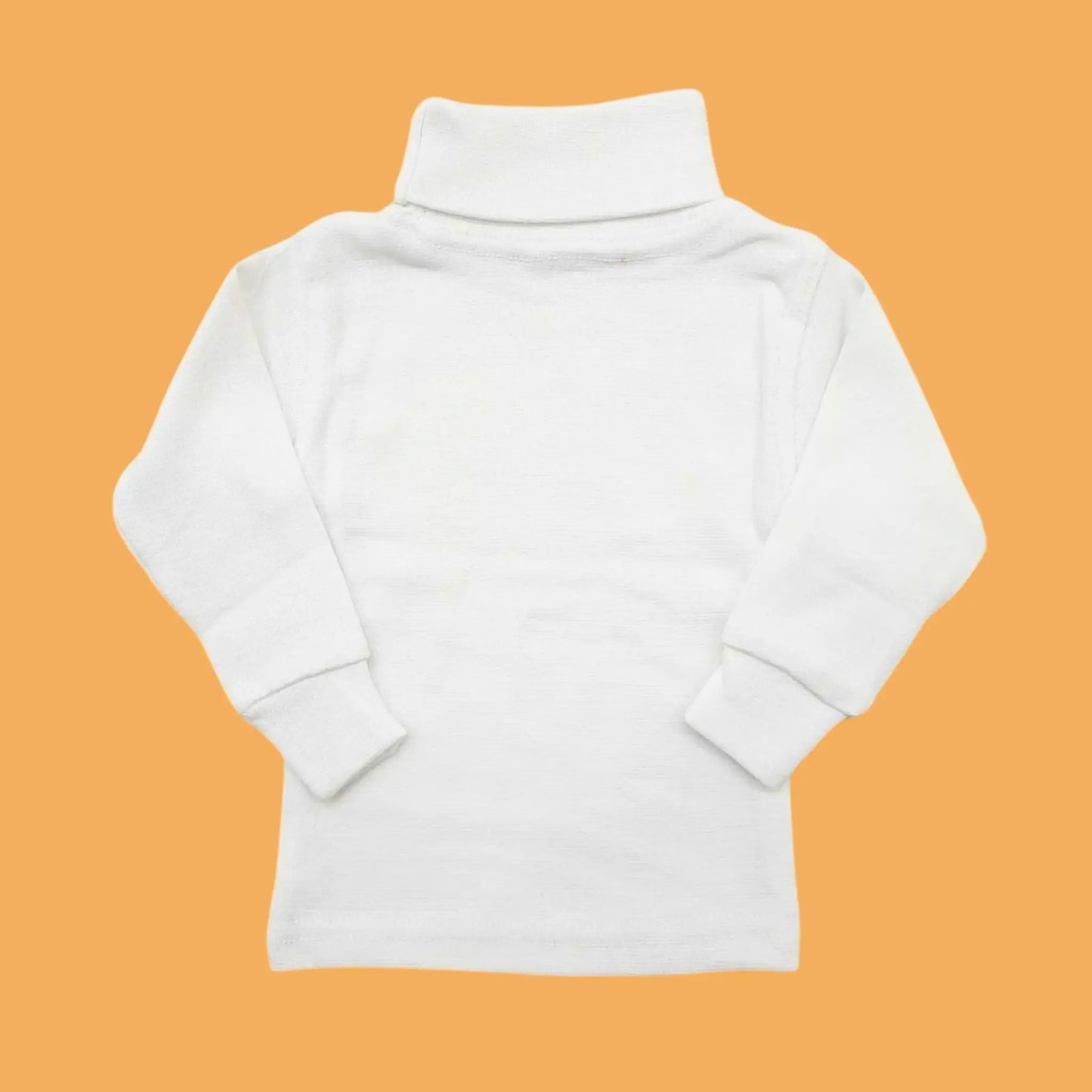 White turtleneck sweater on an orange background