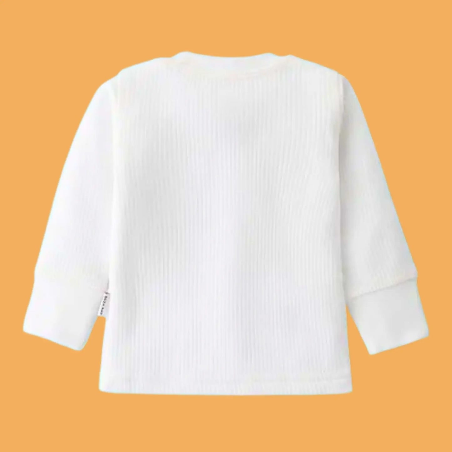 White long-sleeve shirt on a solid orange background