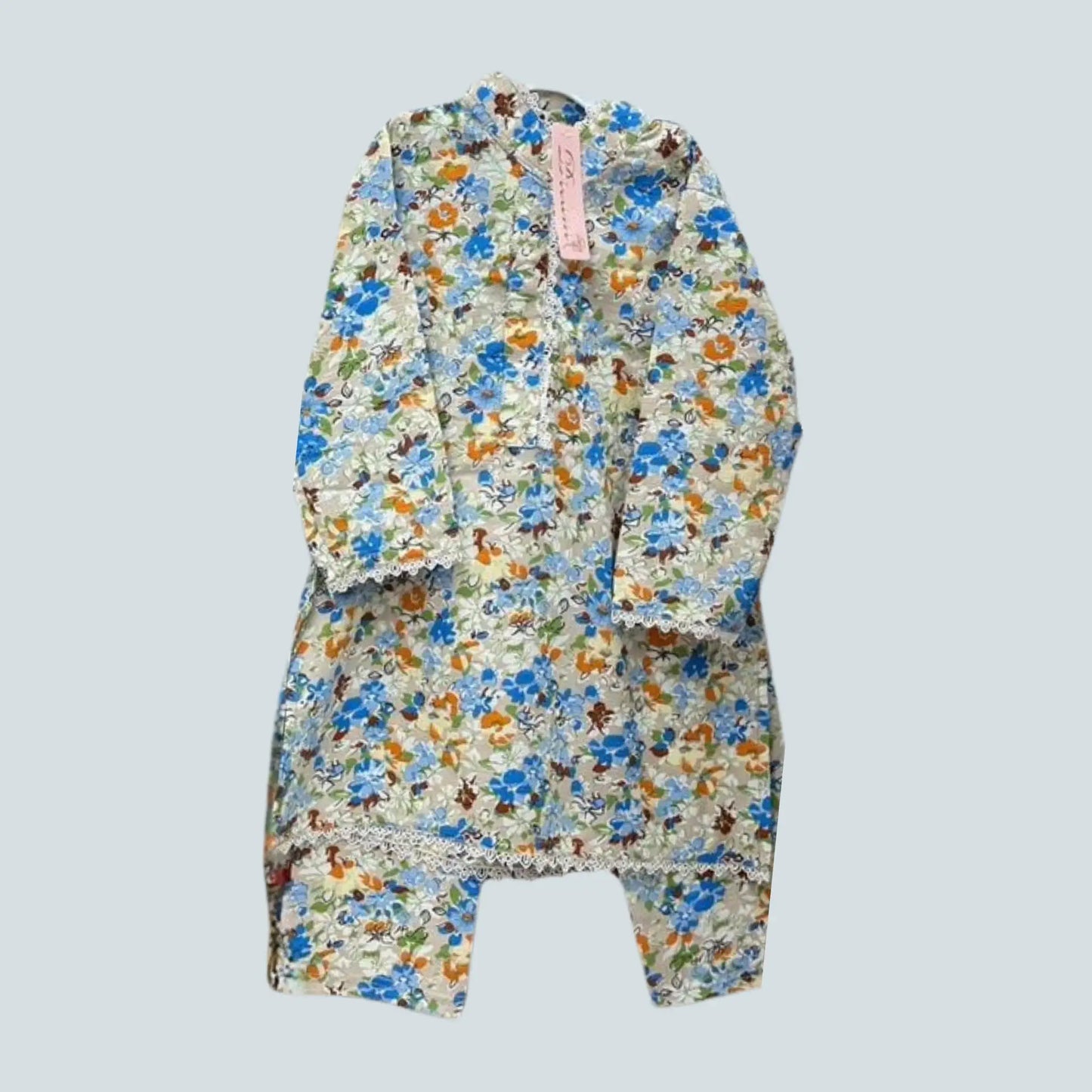Floral-patterned baby outfit on a light gray background