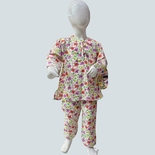 Mannequin wearing a colorful floral outfit on a light gray background