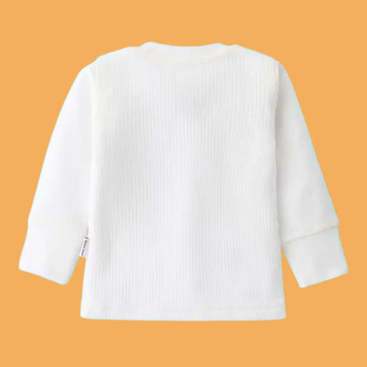 White long-sleeve shirt on a solid orange background