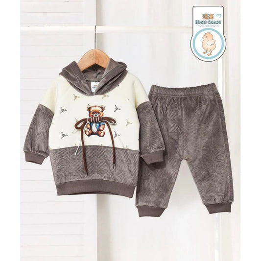 Children's hoodie and pants set with teddy bear design on a white background