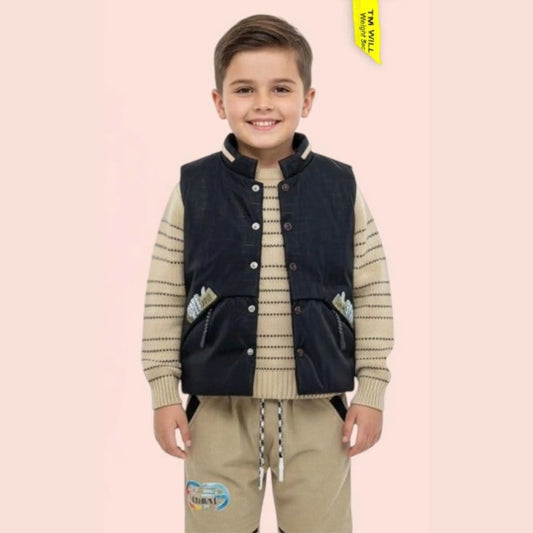 Child wearing a navy vest over a striped shirt on a pink background